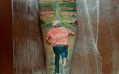 landscape tattoo, skateboarder