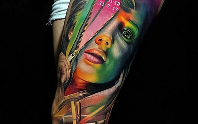 colorful leg tattoo, woman, rose, zipper, rainbow colors