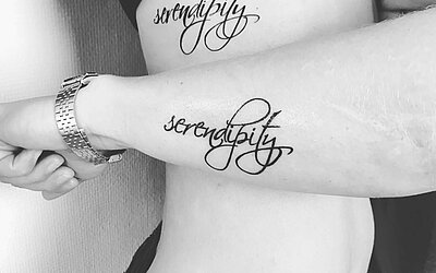 Lettering Tattoo auf dem Arm