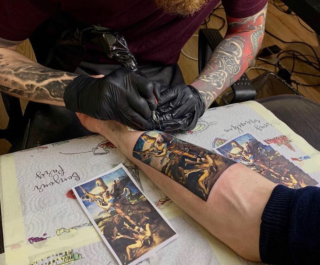 Tattoo artist at work