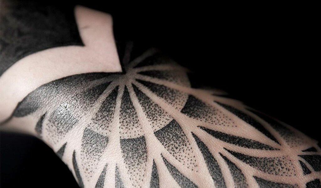 Dotwork mandala tattoo on the left hand