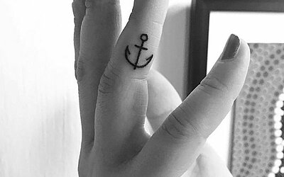 small anchor, finger tattoo